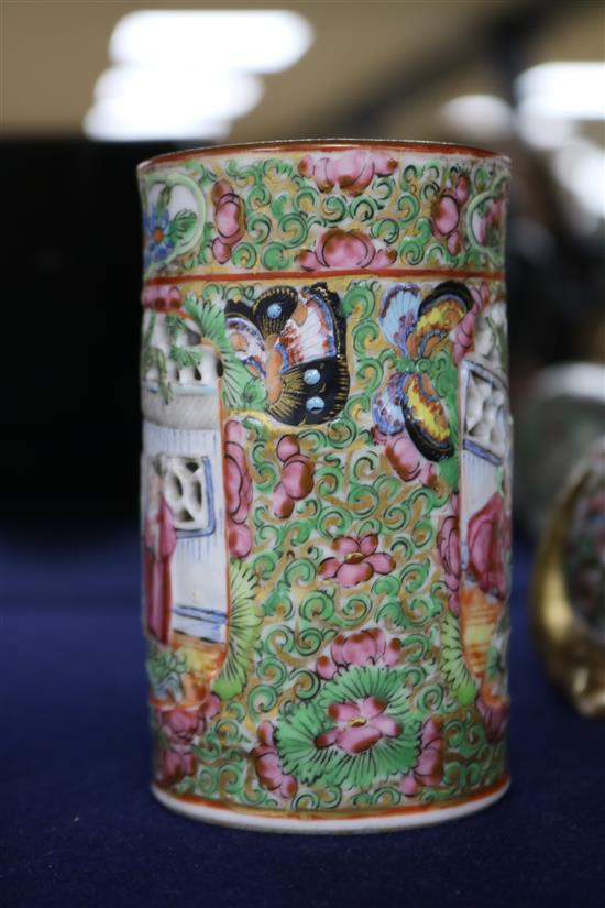 A Japanese Kutani porcelain lion dog candlestick, enamelled and gilt decoration and a Canton vase candlestick height 10cm